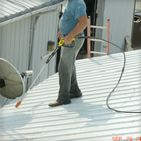 Pressure washing roof surface